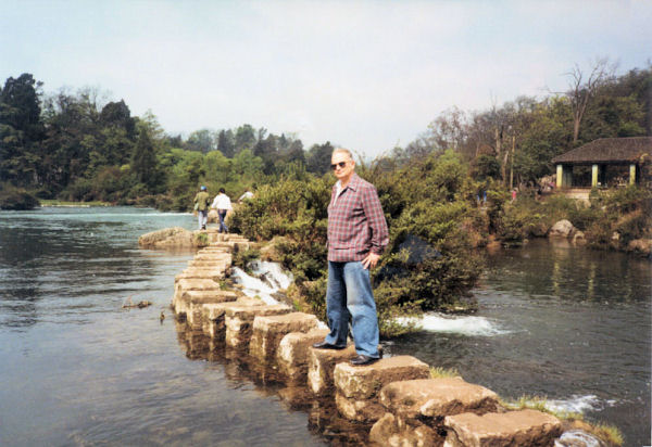 Paul on the Stone Footbridge