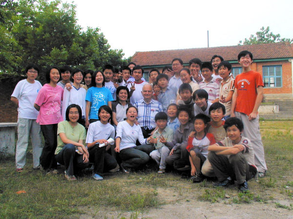 Students Pose with Paul 