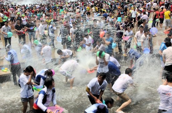 Dai people having fun at the Water-Splashing Festival