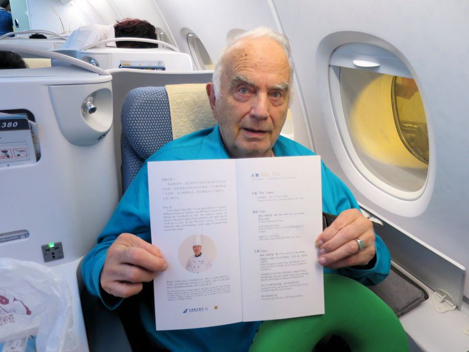 Paul Checks out Menu for this Flight's Food  