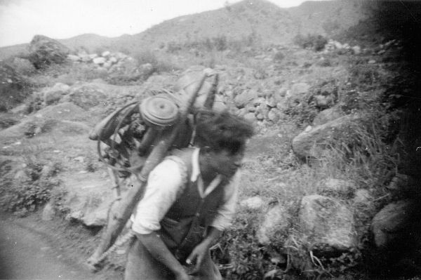 Korean Laborers Carry Equipment to the Top of 1157