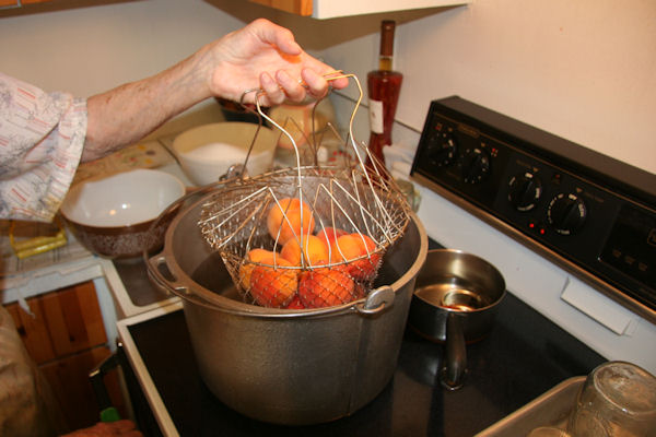 Step 4 - Dip Peaches in Boiling Water