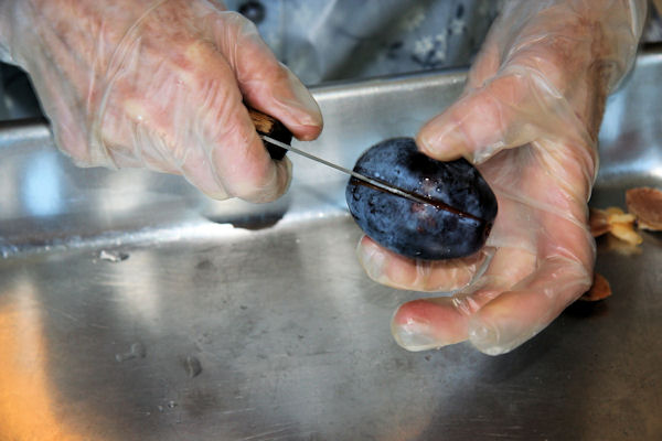 Step 7 - Cut Prunes in Half