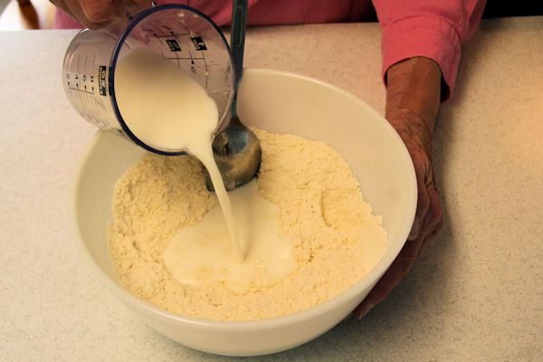 Step 11 - Pour Milk onto Flour