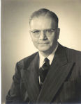 Dr. Claude C. Crawford