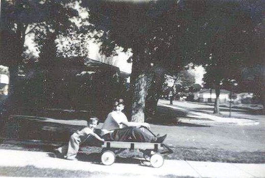 Loren Pushes Paul in the Wagon