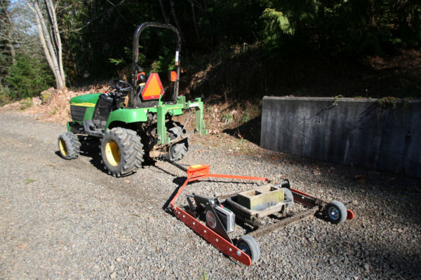 DR Road Grader Hooked to the John Deere 2210