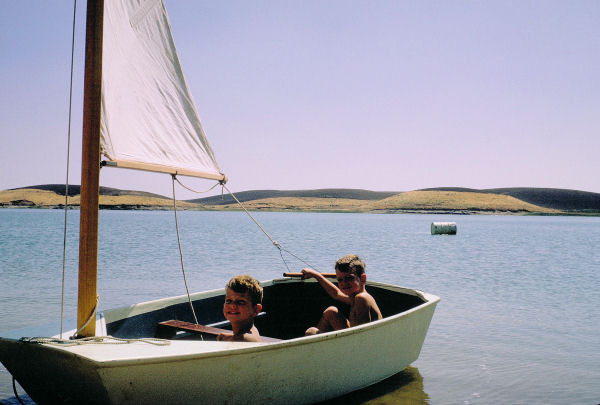 Chet and Landon Pose in our Sail Boat